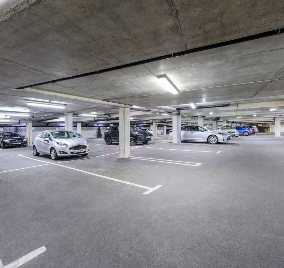 Underground car park at Park Place Apartments, featuring ample parking spaces.