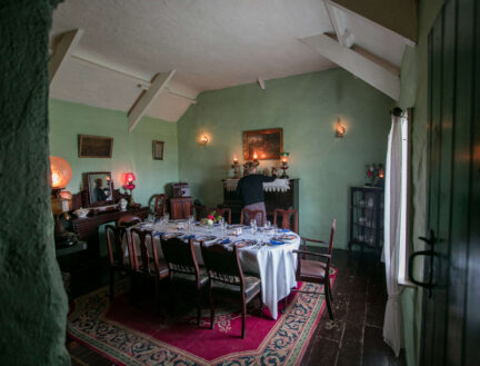 Cosy dining room setup with a family enjoying a meal at Park Place Apartments in Killarney.