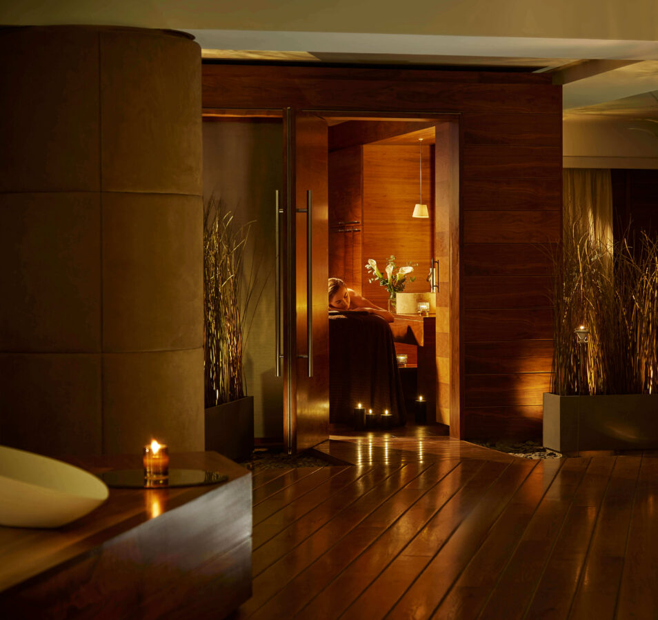 Warm, inviting interior of Park Place Apartments, Killarney, with soft candlelight.