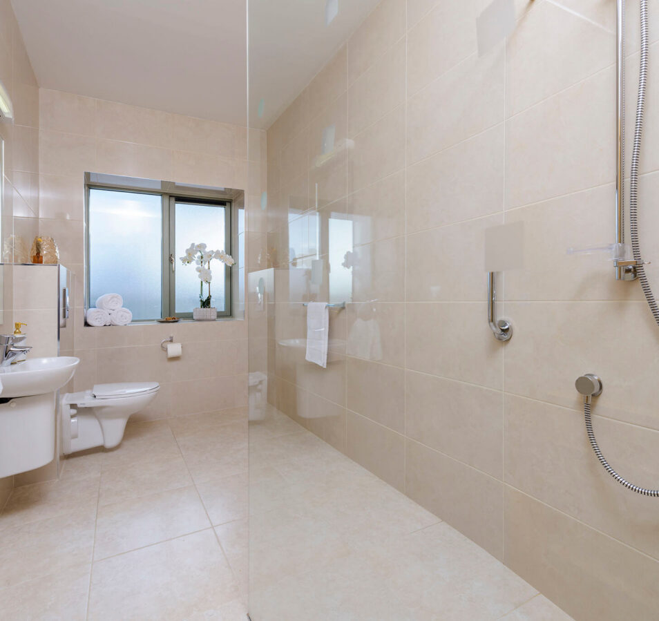 Spacious modern bathroom with elegant design in Park Place Apartments, Killarney.