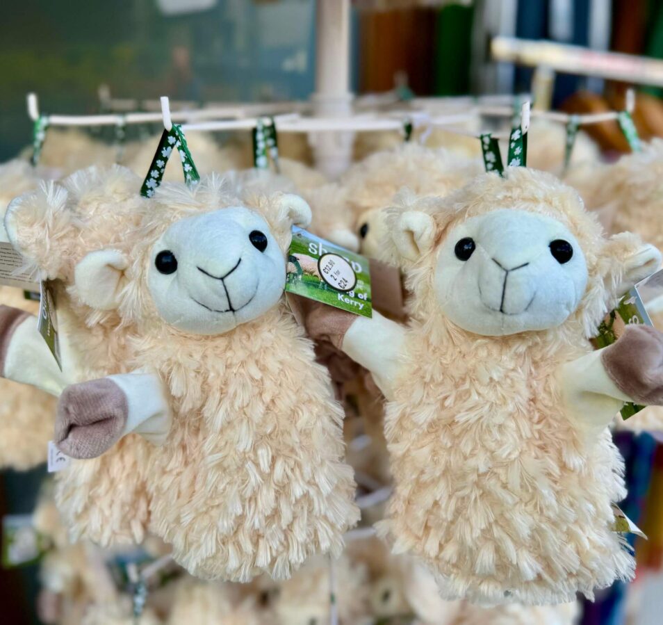 Plush sheep toys with 'Ring of Kerry' tags in a Killarney souvenir shop.