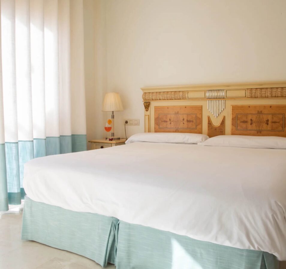 Bright, cosy bedroom with double bed in Park Place Apartments, featuring elegant decor.